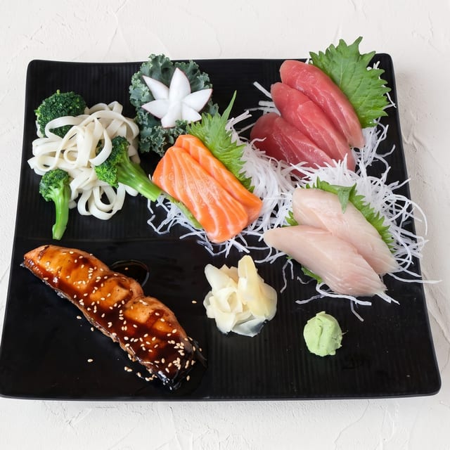 Salmon Teriyaki and Sushi or Sashimi Dinner Combination.